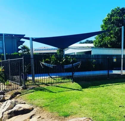 Charcoal pool shade sails at a North Coast residence