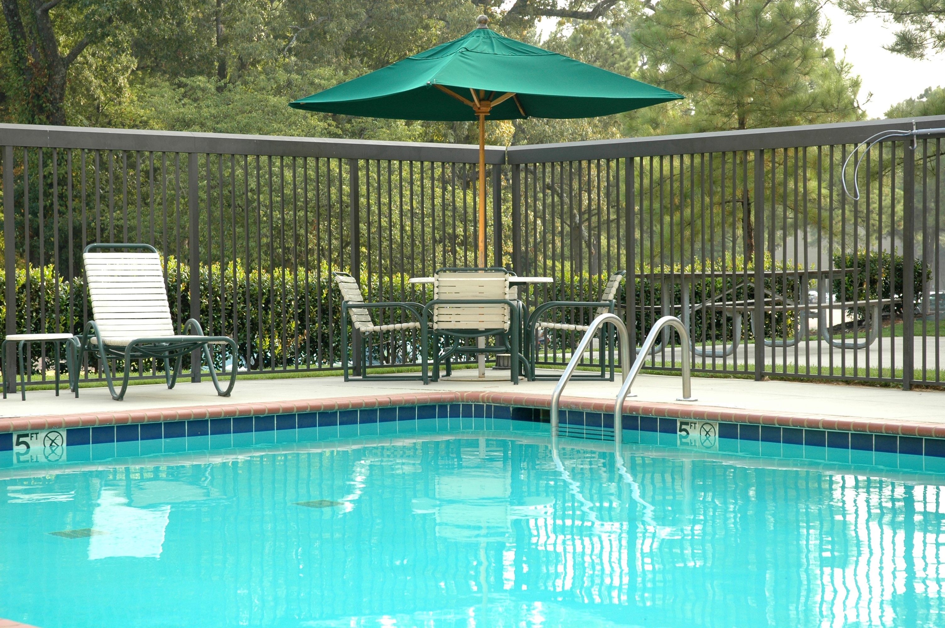 Commercial outdoor umbrellas shading an outdoor dining area